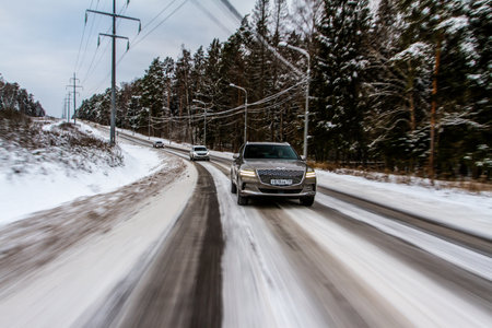 MOSCOW, RUSSIA - DECEMBER 04, 2021 Genesis GV80 (JX1), a modern sedan car. Genesis GV80 in motion view. Genesis JX1のeditorial素材
