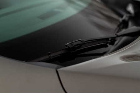 Car windwhield wiper close up. Modern car windshield wiper.