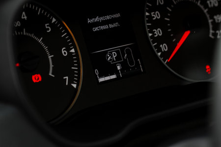 fuel gauge close up. Car fuel dashboard details. Translation "Electronic Stability Program is OFF"の写真素材