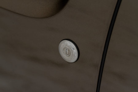 Car door lock and handle. Close up of car key lock. car door key slot,