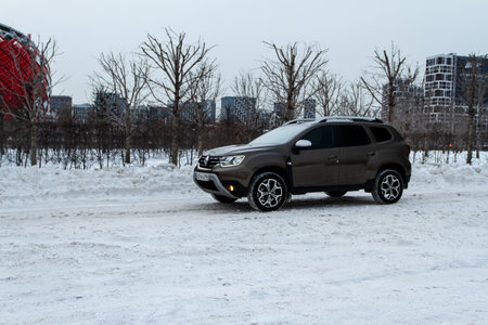 MOSCOW, RUSSIA - JANUARY 09, 2022 Renault Duster (Second generation), subcompact SUV car. Exterior close up side view. Renault Duster model with all-wheel drive.のeditorial素材