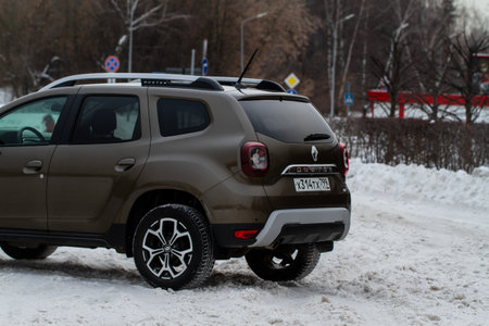 MOSCOW, RUSSIA - JANUARY 09, 2022 Renault Duster (Second generation), subcompact SUV car. Exterior close up side view. Renault Duster model with all-wheel drive.のeditorial素材
