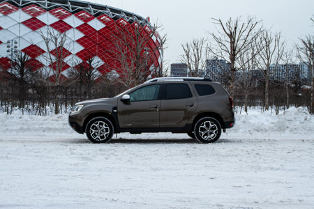 MOSCOW, RUSSIA - JANUARY 09, 2022 Renault Duster (Second generation), subcompact SUV car. Exterior close up side view. Renault Duster model with all-wheel drive.のeditorial素材