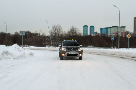MOSCOW, RUSSIA - JANUARY 09, 2022 Renault Duster (Second generation) exterior view in motion. Renault Duster in motion view. Modern SUV car.のeditorial素材
