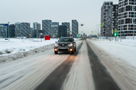MOSCOW, RUSSIA - JANUARY 09, 2022 Renault Duster (Second generation) exterior view in motion. Renault Duster in motion view. Modern SUV car.のeditorial素材