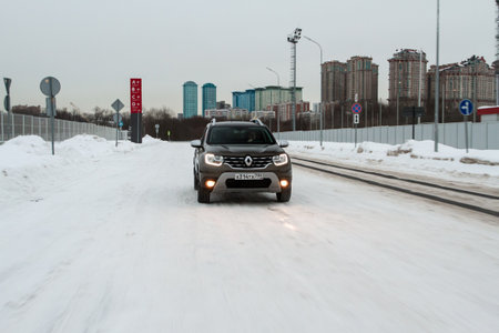 MOSCOW, RUSSIA - JANUARY 09, 2022 Renault Duster (Second generation) exterior view in motion. Renault Duster in motion view. Modern SUV car.のeditorial素材