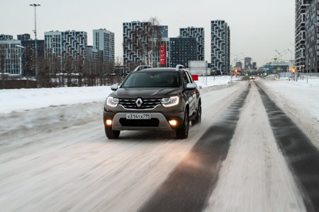 MOSCOW, RUSSIA - JANUARY 09, 2022 Renault Duster (Second generation) exterior view in motion. Renault Duster in motion view. Modern SUV car.のeditorial素材