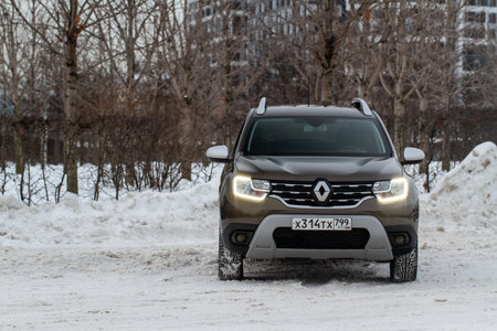 MOSCOW, RUSSIA - JANUARY 09, 2022 Renault Duster (Second generation), subcompact SUV car. Exterior front-side view. Renault Duster model with all-wheel drive.のeditorial素材