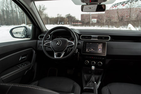 MOSCOW, RUSSIA - JANUARY 09, 2022 Renault Duster (Second generation), interior view. Compact luxury SUV. Central console of the new Renault Duster car.のeditorial素材