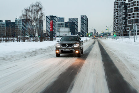MOSCOW, RUSSIA - JANUARY 09, 2022 Renault Duster (Second generation) exterior view in motion. Renault Duster in motion view. Modern SUV car.のeditorial素材
