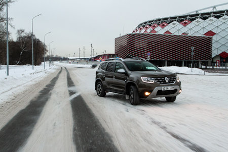 MOSCOW, RUSSIA - JANUARY 09, 2022 Renault Duster (Second generation) exterior view in motion. Renault Duster in motion view. Modern SUV car.のeditorial素材
