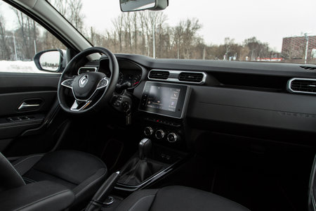 MOSCOW, RUSSIA - JANUARY 09, 2022 Renault Duster (Second generation), interior view. Compact luxury SUV. Central console of the new Renault Duster car.のeditorial素材