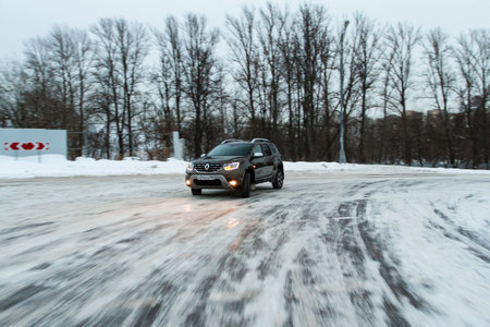 MOSCOW, RUSSIA - JANUARY 09, 2022 Renault Duster (Second generation) exterior view in motion. Renault Duster in motion view. Modern SUV car.のeditorial素材