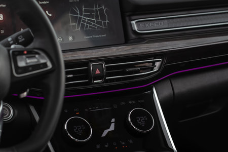 Moscow, Russia - December 18, 2021 Exeed VX also called Lanyue, midsize crossover car. Warning button in a car. Car emergency stop button. Translation of "Say open window"のeditorial素材