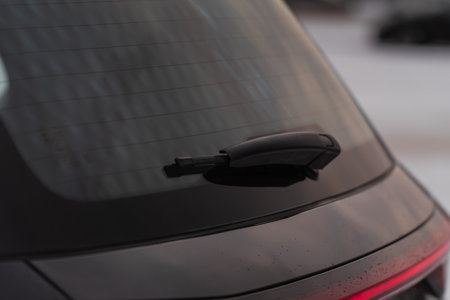 car rear window. A car wiper cleans the rear window.の写真素材