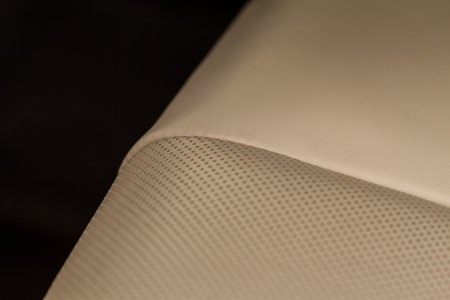 Part of leather car seat. macro. Car leather interior details. High angle view of modern car fabric seats.の写真素材