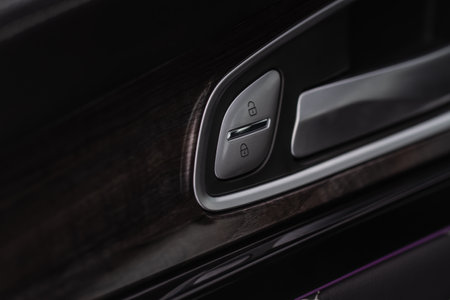 Car central door lock and unlock button close up. Close and open signs.の写真素材