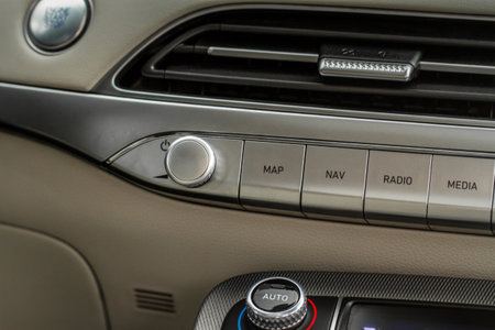 Car media buttons dashboard. Detail of a modern car controller.の写真素材