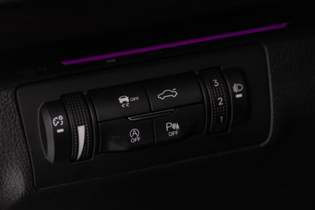 Close up view of modern car electronic safety systems control panel. Modern car interior detail.の写真素材