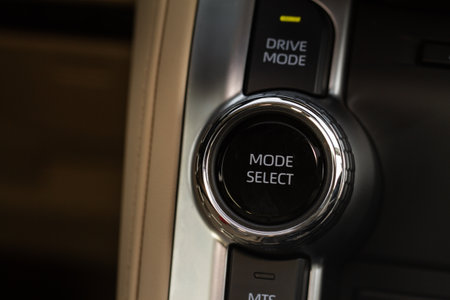 drive selector button. Car interior, offroad drive controller closeup view. Wheel drive selection. Four-Wheel Drive transmission selection system.の写真素材