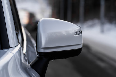 Side rear-view mirror on a modern car. Close up photo of a car mirror. Close up front side view of rear view mirror.の写真素材
