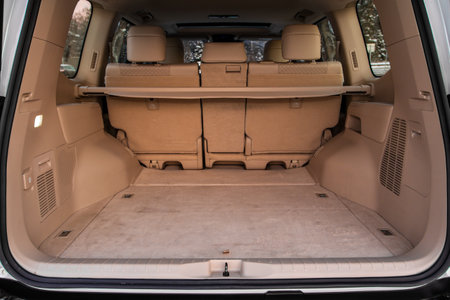 Huge, clean and empty car trunk in interior of compact suv. Rear view of a SUV car with open trunkの写真素材