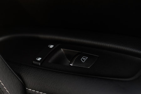car window control panel. Automatic power window up and down button.の写真素材