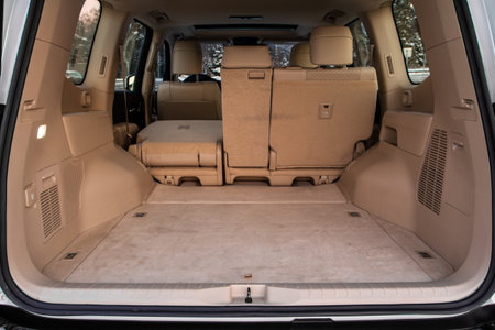 Huge, clean and empty car trunk in interior of compact suv. Rear view of a SUV car with open trunkの写真素材