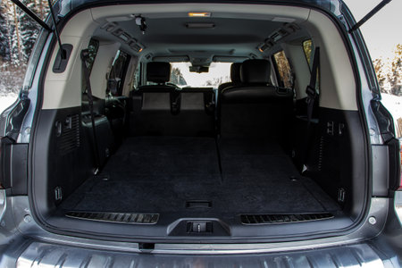 Huge, clean and empty car trunk in interior of compact suv. Rear view of a SUV car with open trunkの写真素材