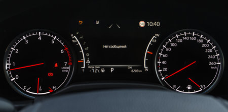 Close up shot with the digital car dashboard. Illuminated car dashboard. Translation "No messages. Temp. outside"の写真素材