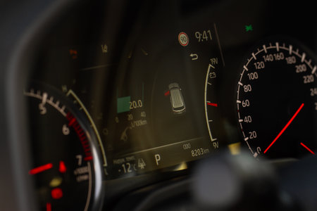 Color detail of an error message on a car dashboard. Door opened alarm. Warning light.の写真素材