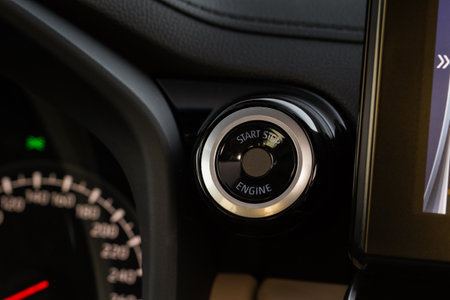 Engine start button with fingerpint close up. car start button.の写真素材