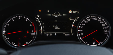 Close up shot with the digital car dashboard. Illuminated car dashboard. Translation "EOC indicator. Temp. outside"の写真素材