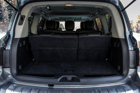 Huge, clean and empty car trunk in interior of compact suv. Rear view of a SUV car with open trunkの写真素材