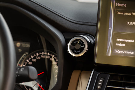 Engine start button with fingerpint close up. car start button.の写真素材