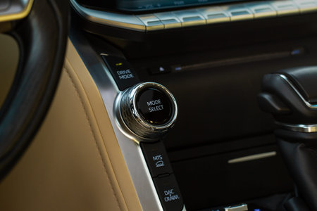 Car driving mode switch. Drive mode selector button.