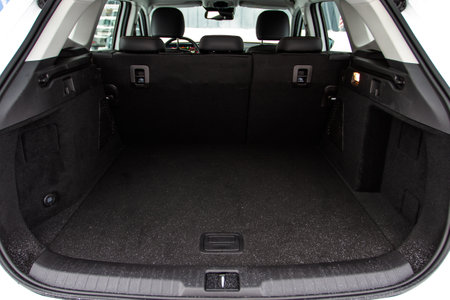 Huge, clean and empty car trunk in interior of compact suv. Rear view of a SUV car with open trunkの写真素材