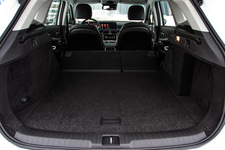 Huge, clean and empty car trunk in interior of compact suv. Rear view of a SUV car with open trunkの写真素材