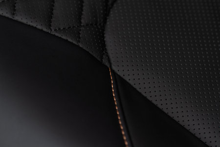 Part of leather car seat. macro. Car leather interior details. High angle view of modern car fabric seats.の写真素材