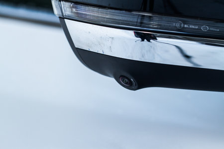 Close up view of surround view camera system on modern car side rear mirror. Blind spot and parking assistant camera. Parking assistance camera.の写真素材