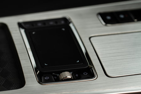 Car media controller close up. Modern car media and navigation controlsの写真素材