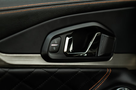 Car central door lock and unlock button close up. Close and open signs.の写真素材