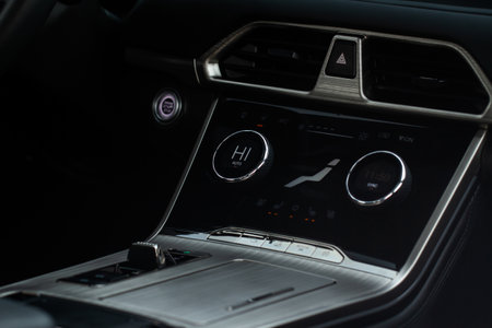 Digital control panel car air conditioner dashboard. Modern car interior conditioning buttons inside a car close up view.の写真素材
