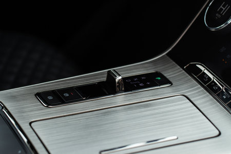 Modern car automatic gearbox. Gearbox control buttons. Gear selector close up.の写真素材