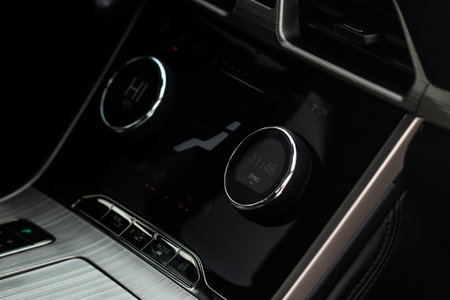 Modern car passenger's temperature control. Car air conditioning system button. automatic climate control system.の写真素材