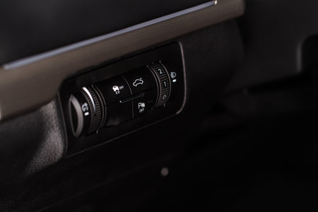 Parking assistance switch. Modern car electronic safety systems. Parking assistant button.の写真素材