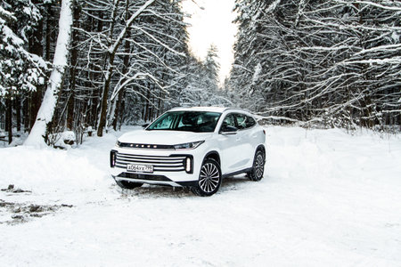 Moscow, Russia - December 25, 2021 Chery Exeed TXL car also called Vantas TX, midsize crossover car. Exterior front-side view. Exeed TXL model with all-wheel drive.のeditorial素材