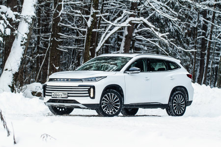 Moscow, Russia - December 25, 2021 Chery Exeed TXL car also called Vantas TX, midsize crossover car. Exterior front-side view. Exeed TXL model with all-wheel drive.のeditorial素材