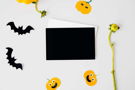 large orange pumpkins on a white background with a candle. Autumn moodの写真素材