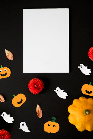 large orange pumpkins on a white background with a candle. Autumn moodの写真素材